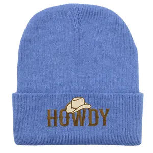 Blue knitted beanie featuring brown HOWDY embroidery and a small cowboy hat design