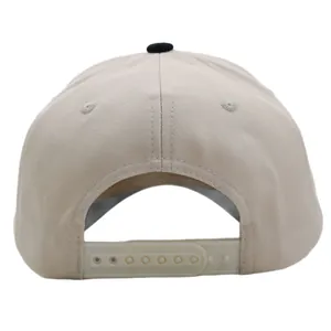 Beige and black vintage trucker hat with adjustable snapback closure and premium stitching