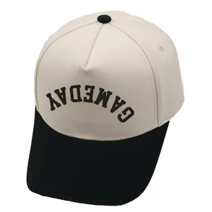 Two-tone baseball cap in beige and black with inverted GAMEDAY embroidery design