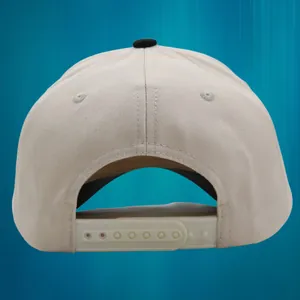 Beige 5-panel snapback baseball cap with plastic closure and black top button view