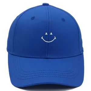 Classic navy blue cotton baseball cap featuring white embroidered smile face pattern