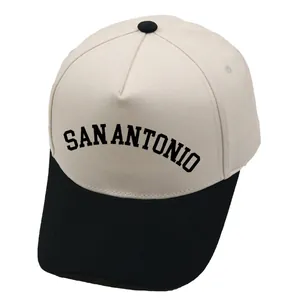 Detail of five-panel baseball cap showing SAN ANTONIO embroidery and contrast visor