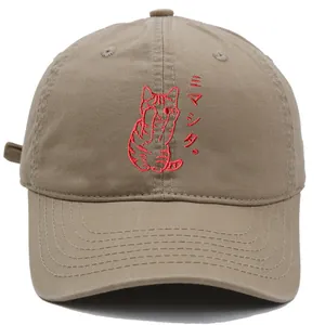 Khaki cotton baseball cap with red cat embroidery and Japanese text on front view