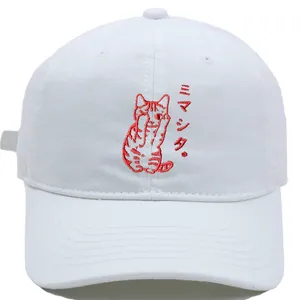 White cotton baseball cap featuring a shy red cat embroidery and Japanese text