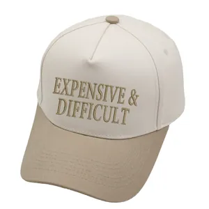 Καπέλο trucker με κέντημα Expensive & Difficult σε λευκό και χακί δίχρωμο σχέδιο