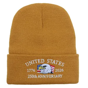 Detailed embroidery of US Marine Corps eagle on 250th anniversary yellow knit beanie