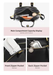 Detail view of black leather bowling bag showing spacious interior and golden zippers
