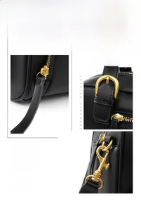 Close-up of premium black leather texture and gold-plated hardware on the bowling bag