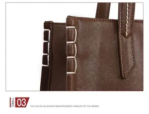 Détail du sac cabas marron montrant la texture du cuir et les surpiqûres blanches