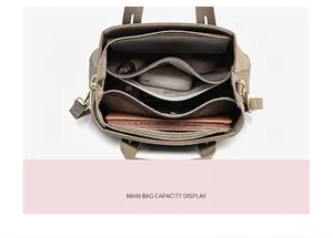 Top-down view of a TOGO leather tote bag interior with three spacious compartments