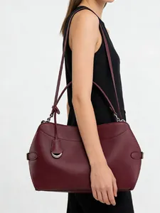 Elegant burgundy leather tote bag for women with silver hardware and large capacity