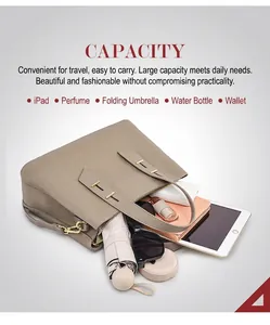Top view of large elephant gray leather tote bag showing spacious interior with iPad and items