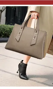 Taupe Togo leather tote bag with lychee texture and gold metal accents for women