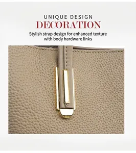 Detail of high-quality pebbled leather texture with polished gold-tone metal buckle