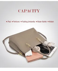 Spacious interior of gray pebble leather tote bag showing capacity for iPad and essentials