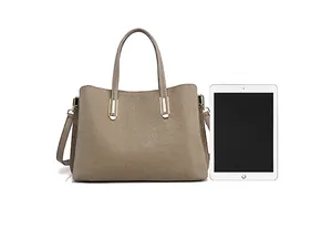 Taupe leather tote bag with pebbled texture shown next to iPad for capacity comparison