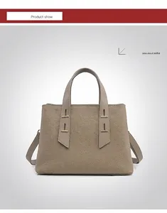 Front view of light taupe TOGO leather tote bag with gold metal hardware details