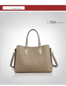 Detailed front view of khaki litchi grain leather handbag with gold-tone hardware