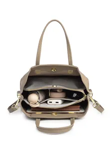 Beige pebble leather tote bag with dual handles and spacious inner compartments for 10-inch tablets