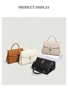 Collection of textured leather handbags in brown, white, beige, and black with gold buckles