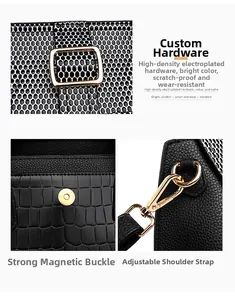 Detail showing crocodile texture leather, golden hardware, and adjustable strap of tote bag