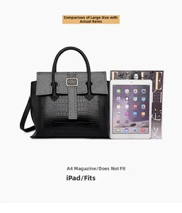 Close-up of black crocodile pattern tote with iPad and magazine for size comparison