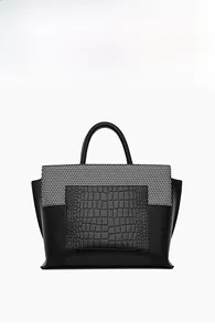 Front view of black tote bag featuring faux crocodile texture and lychee grain leather