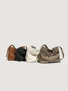 Minimalist leather tote bags in four neutral colors with buckle details for women