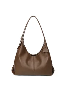 Brown litchi leather tote bag with bear charm and adjustable shoulder strap