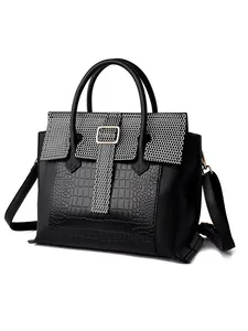 Chic black and white crocodile texture tote bag with gold buckle and top handle