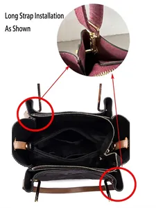 Detail showing inner compartments with gold hardware and red detachable strap on tote bag