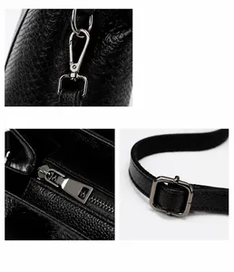 Detail of black lychee grain leather tote with gunmetal hardware and adjustable strap