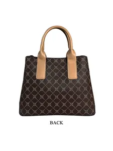 Achteraanzicht van een vintage monogram shopper met bruin patroon en dubbele hengsels