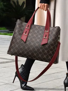 Borsa tote marrone monogramma con manici in pelle rossa e tracolla rimovibile da donna