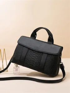 Chic black litchi pattern leather tote bag for women with top handle and shoulder strap