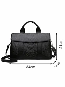 Elegant black faux leather tote bag with crocodile texture and adjustable shoulder strap