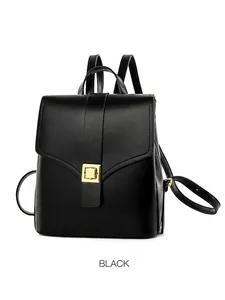 Minimalist black backpack with gold buckle and flap closure for casual commuting