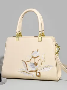 Elegante borsa a mano con ricamo a tulipano, hardware dorato e tracolla regolabile