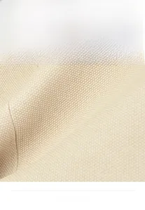 Detailed macro view of premium beige PU fabric with high-quality litchi grain texture