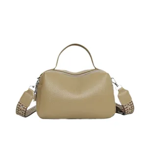 Khaki leather Boston bag with chic geometric patterned strap on a white background