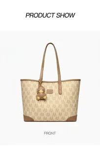 Detailed front view of tote bag featuring M-letter print and brown duck charm