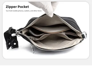 Internal view of crossbody bag featuring multi-layer storage pockets and light lining