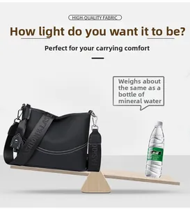 Lightweight black leather shoulder bag balanced against a water bottle showing low weight