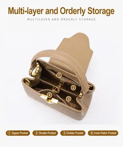 Top view of brown lychee leather bucket bag showing organized interior pockets and lining