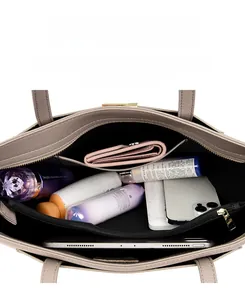 Top view of spacious tote bag interior with multiple compartments and zipper pocket