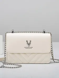 Beige Crossbody-Tasche mit V-Steppung, Kunstleder und silbernem Hirschkopf-Dekor