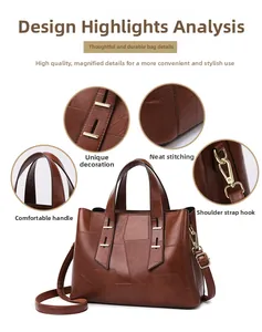 Detailed close-up showing leather texture, stitching, handles and metal hooks of the tote bag