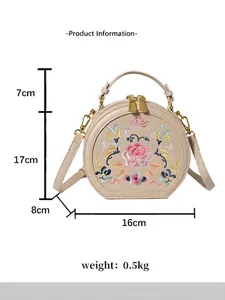 Round cream crossbody bag with floral embroidery and detailed product dimensions shown