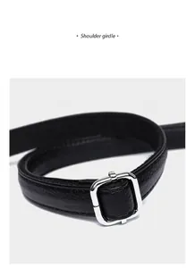 Detail of adjustable black pebble grain leather shoulder strap with silver metal buckle