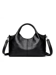 Klassieke zwarte minimalistische handtas voor dames met zilverkleurige metalen accenten